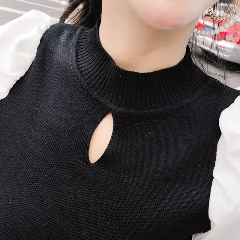 Женский вязаный свитер с рукавами-фонариками облегающий круглым вырезом в стиле