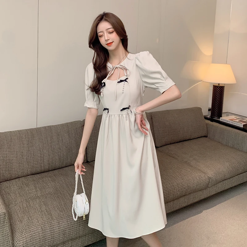 

Summer new bow splicing hollowed bind loose short-sleeved dress fashionable Korean tide