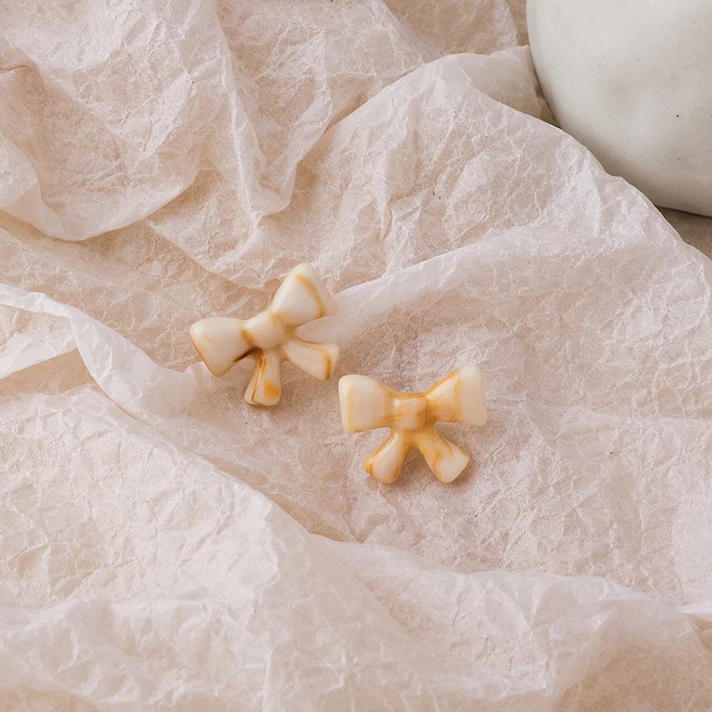 

New Korean Kawaii Resin Acrylic Bow Stud Earrings Cute Bow Transparent Statement Dainty Earring Fashion Jewelry 2021 Wholesale