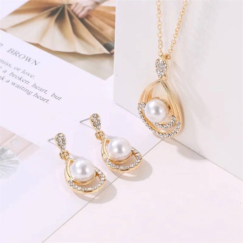 

Temperament water drop type necklace earrings two piece new personality fashion bride pearl jewelry set wedding jewelry