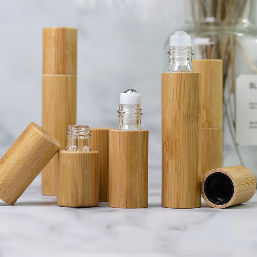 

Hot sale New Bamboo Wood Bottle Perfume Empty Oil Bottle Stainless Roll On Ball Perfume Aromatherapy Bottle Oil Roller Bottle