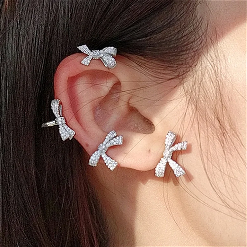 

LOVOACC Fantasy Sparkly Full Rhinestones Bowknot Earrings for Women Silver Color Alloy Knotted Clip Earrings Wedding Jewelry