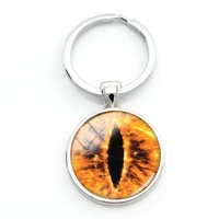 tafree 1 pcs sell evil dragon eye images key holders blue yellow red background cat eyes keychain metal pendant jewelrys