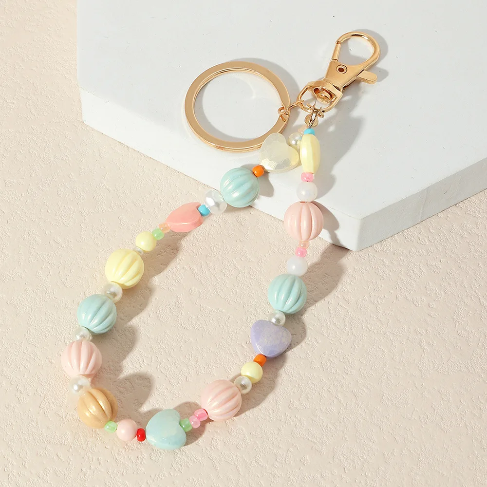 

Cool Personality Beach Style White Imitation Pearl Color Sunken Stripes Sphere Round Beads Heart-Shaped Women's Keychain Jewelry