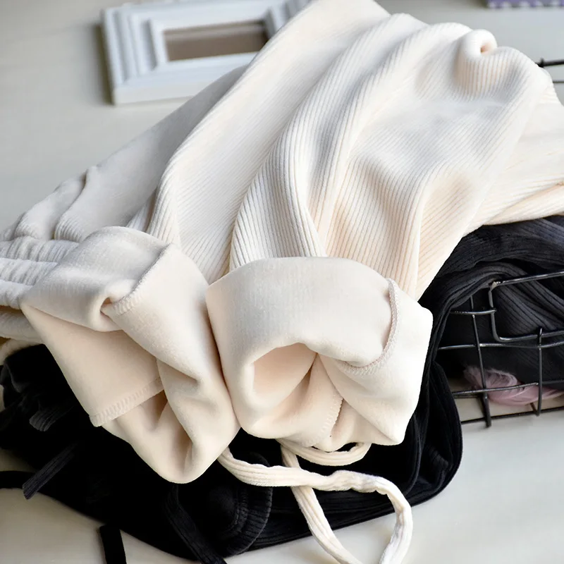 Утепленные зимние женские брюки с норковым пухом свободные мягкие эластичные