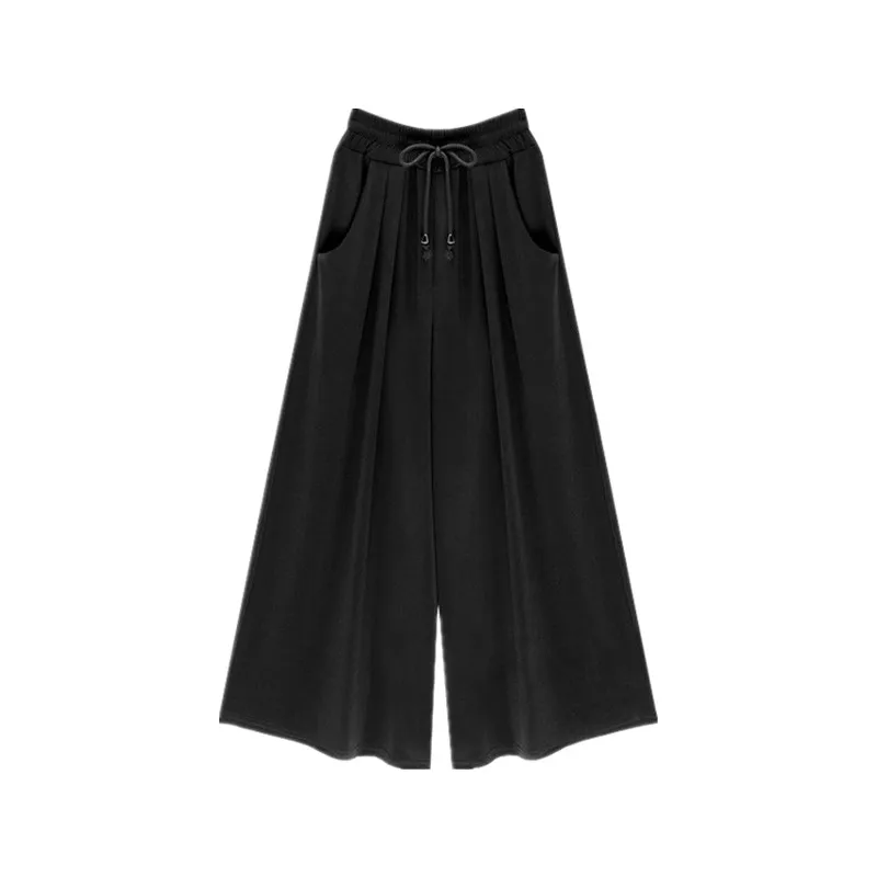 Брюки женские летние с широкими штанинами эластичные свободные штаны-султанки в