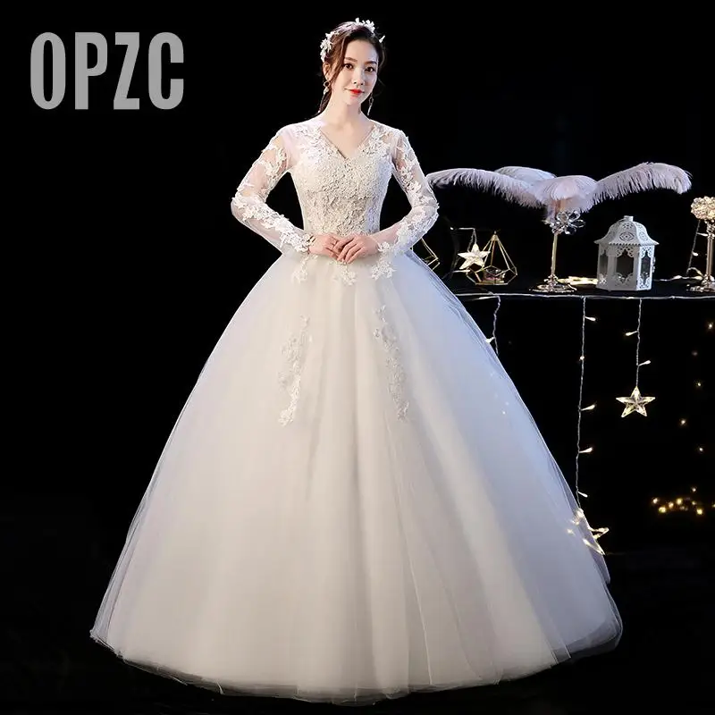 Женское свадебное платье белое кружевное с аппликацией длинным рукавом и до