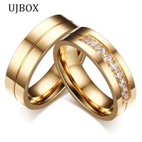 hot top selling wedding ring engagement ring for women men gold color stainless steel wedding bands for couples cz stone r323g