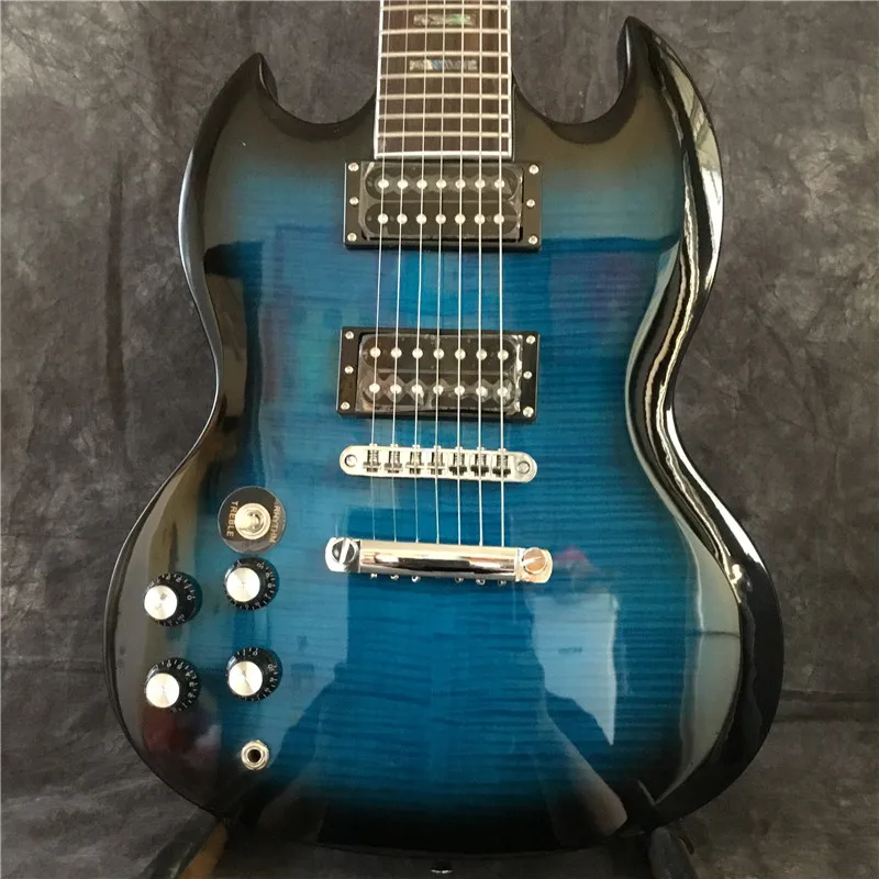 

High-quality customized left-handed electric guitar, maple flame top, color shell inlaid fingerboard, 7-string blue