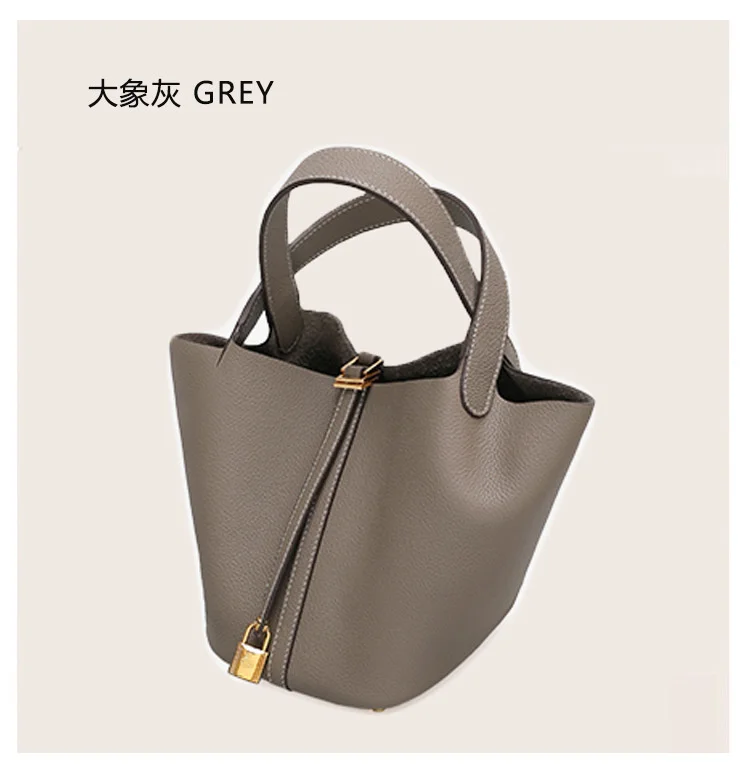 

2021 new vegetable basket bag shopping bag fashion women's bag lychee pattern one shoulder handbag head leather Bucket Bag