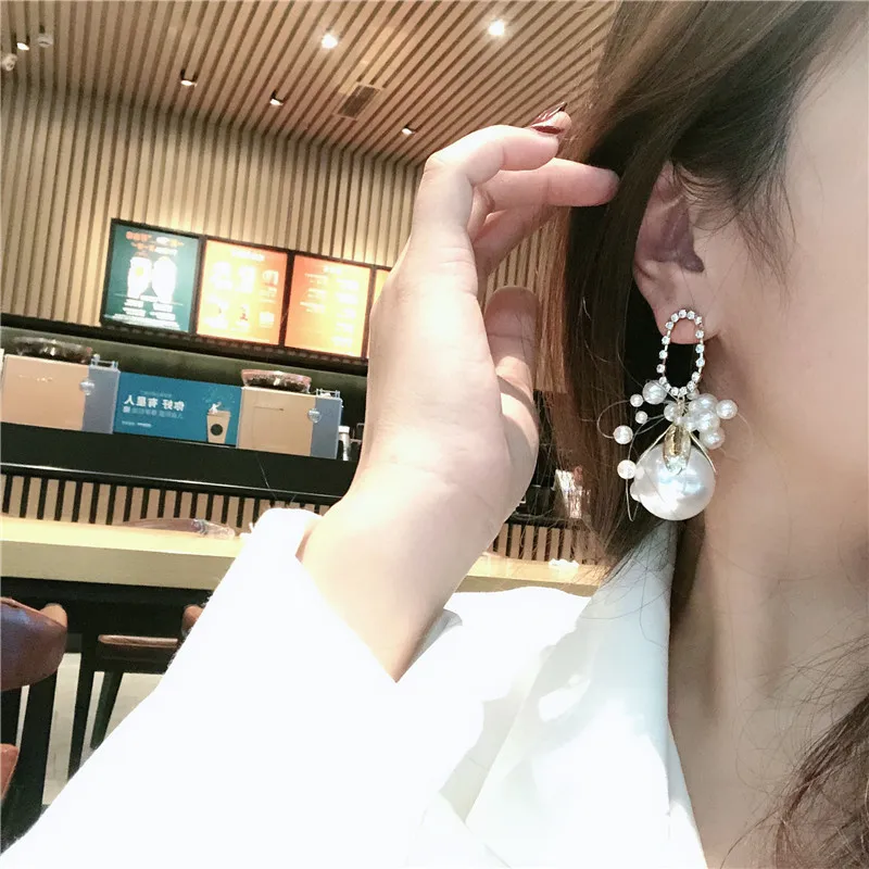

Silver Needle South Korea Korean version of the new temperament fresh mermaid line big pearl exaggerated sweet big earrings wild