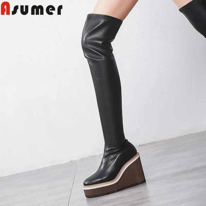 Женские ботфорты без застежки ASUMER черные на платформе с круглым носком высоком