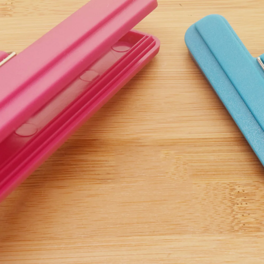 

9Pcs Food Sealing Clips Portable Moisture-proof Fresh-keeping Clamp Snack Sealers for Home Kitchen (Random Color)