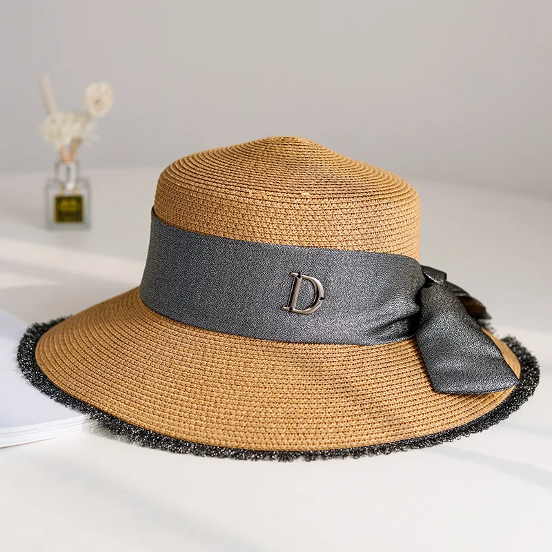 Соломенная шляпа с большим бантом для весны и лета |