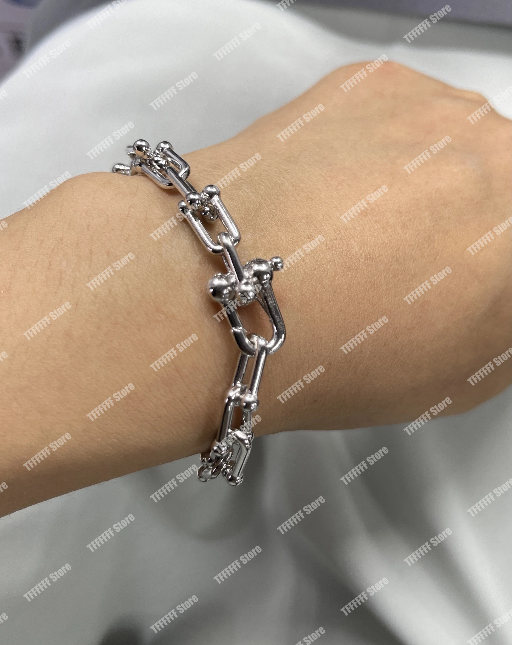 

1: 1925 Sterling Silver Bracelet with thick silver chain and heart-shaped pendant for lovers