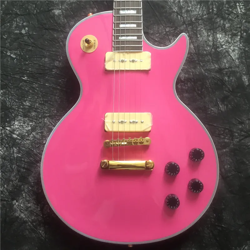 

High-quality electric guitar, pink, top quality, P90 pickups