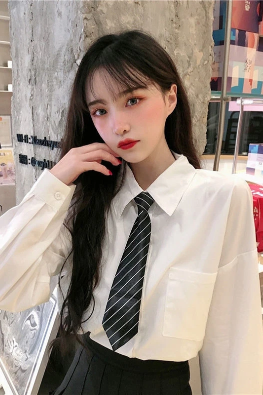 

Autumn 2020 new Korean white shirt women's design sense niche top versatile loose student Tie Shirt