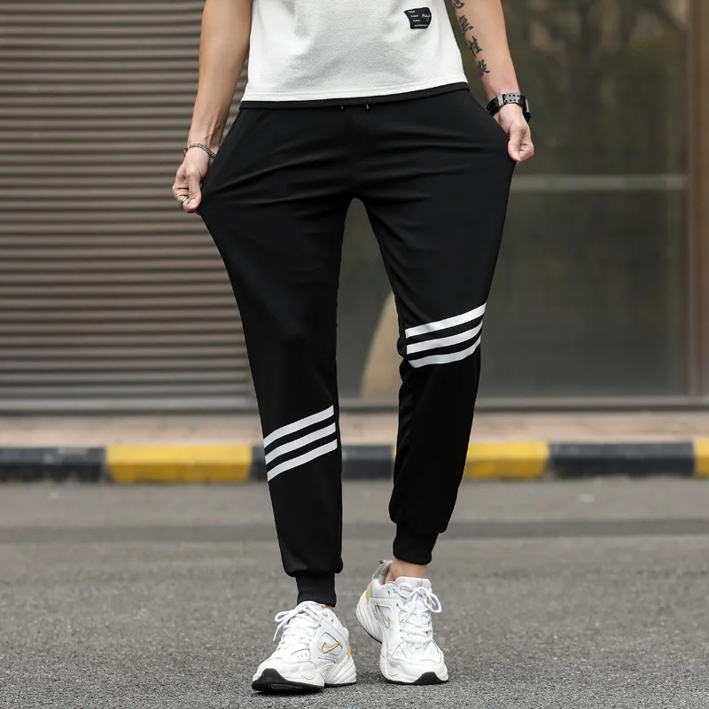 

Men's Sports Pants Spring New Men's Clothing Pants Elastic Waist Stretch Sports Pants Fashion Casual Loose Trousers Harem Pants