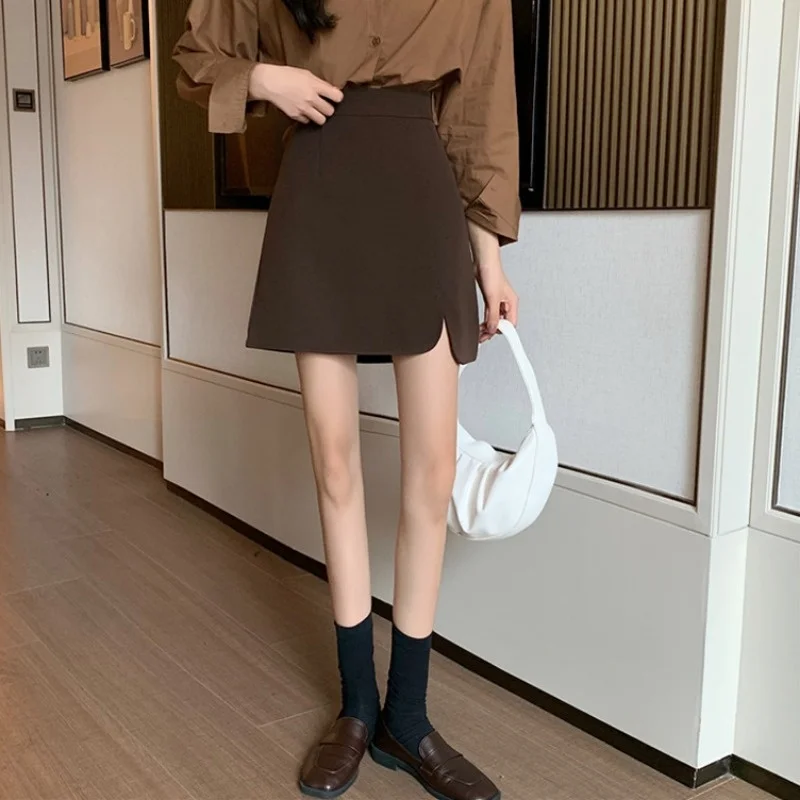 Женская короткая юбка с запахом черная тонкая трапециевидная высокой талией на