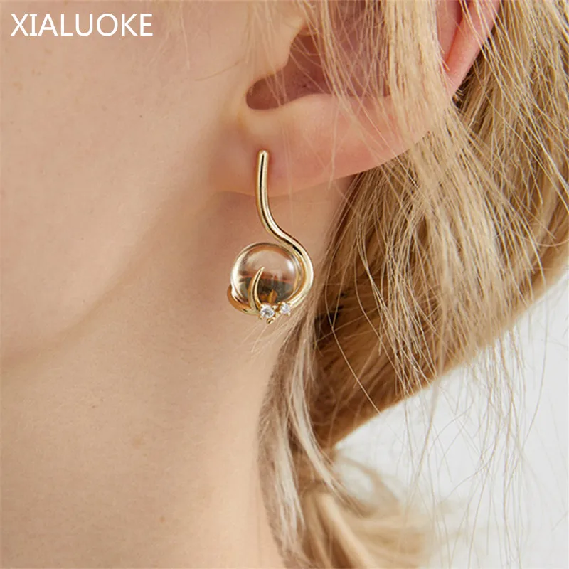 

XIALUOKE Fashion Metal Irregular Crystal Transparent Ball Stud Earrings For Women French Retro Joker Earring Party Jewelry 2512