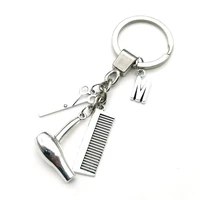 2021 26 letters gift key rings hair dryer letter keyring hair stylist essential hair dryer scissors comb decorative keychains