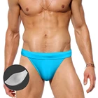 Новые мужские плавки с пуш-подушками, модные однотонные стринги, европейские и американские сексуальные купальники с низкой талией, летние пляжные спортивные трусы для серфинга