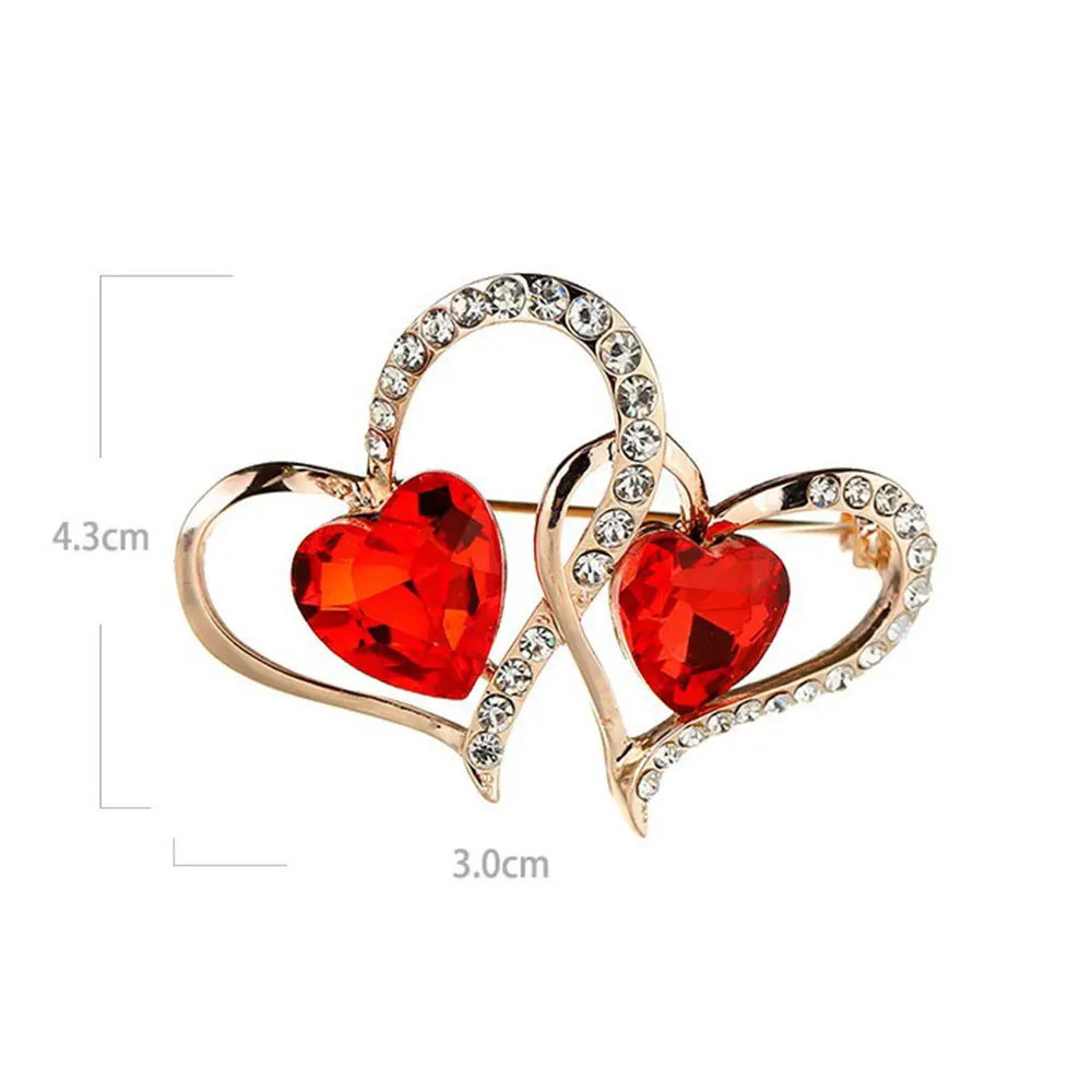 

Diamonds zircons heart-shaped brooches