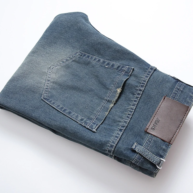 

2021 Men's Hot Selling Jeans With Holes Men's Wear Wear Wear White And Nostalgia Light Blue Rotten Wiring Holes Korean Jeans