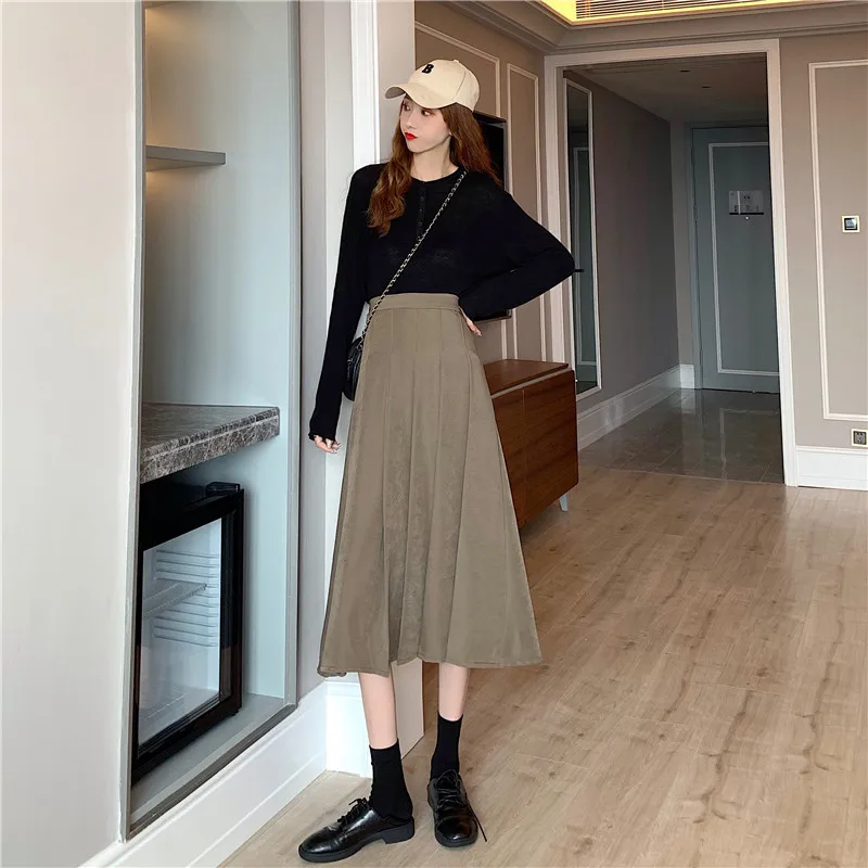 

2021 Spring and autumn new temperament black pleated skirt mid-length high-waist A-line skirt Korean Buttocks slim skirt female