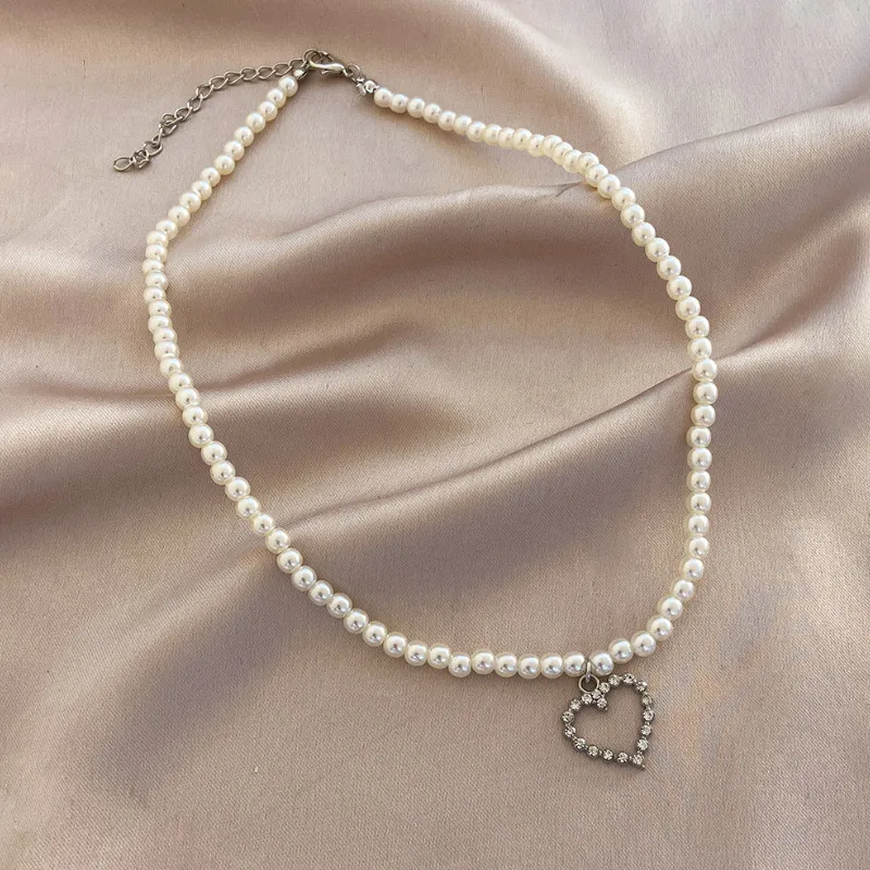 

Sweet Trendy Pearl Clavicle Chain Hollow Heart Necklace Gift Wholesale Simple Jewelry for Women
