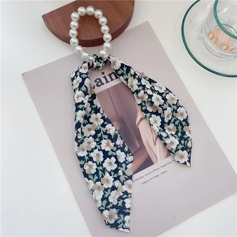 

The New Super Fairy Floral Pearl Hair Rope Sweet and Versatile Long Streamer Head Rope Hair Accessories Headdress