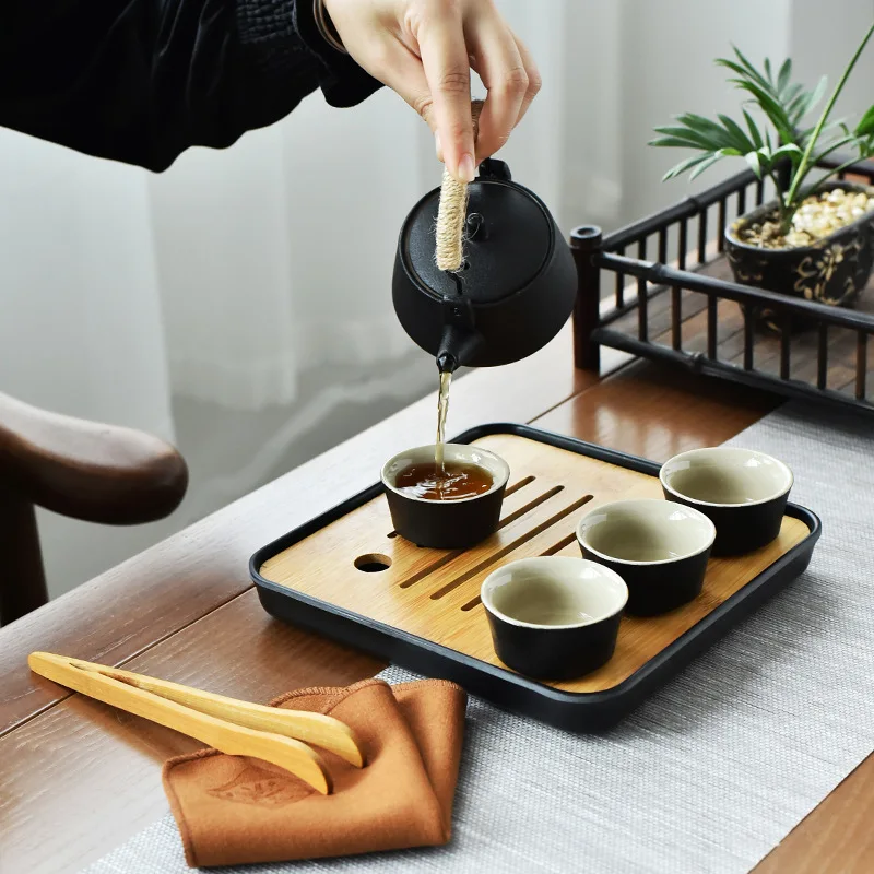 

Japanese Style Black Pottery Beam Teapot Tea Set One Pot Four Cups With Bag Kungfu Home Tea Set Office Travel Teaware Good Gifts