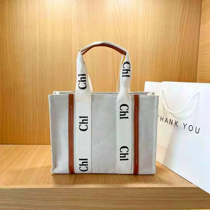 

2021 New Summer Casual Large-Capacity Fashion Canvas Striped Letter Printing Brand Luxury Women'S Shoulder Tote Shopping Handbag