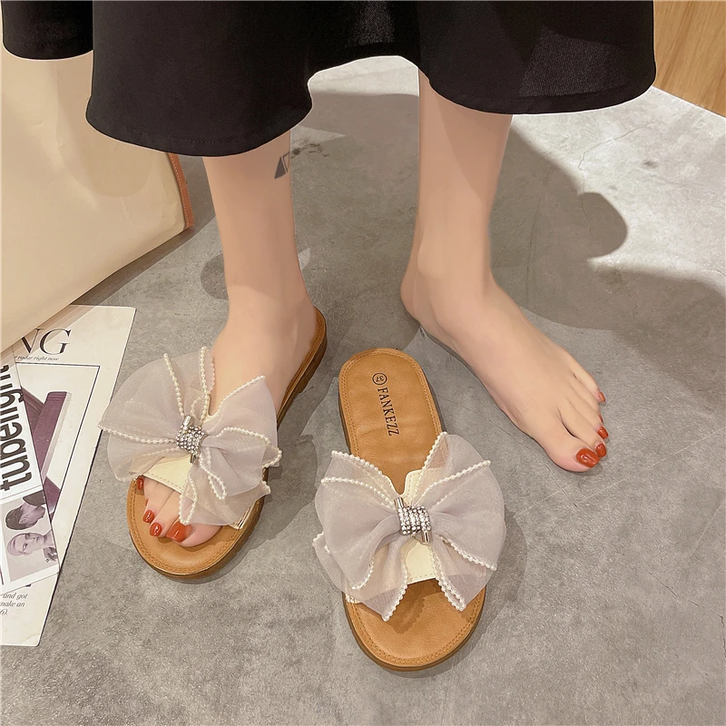 

Slippers Casual Flat Shoes Female Summer Clogs Woman Pantofle Butterfly-Knot Slides Luxury Rubber Beach 2021 Basic Fashion Butte