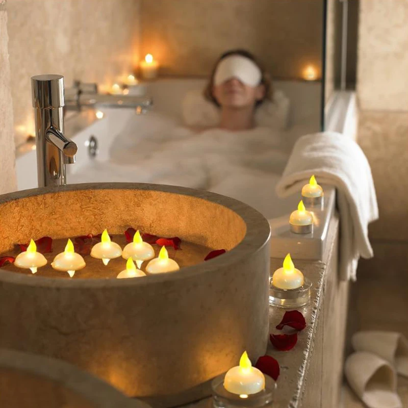 

12Pcs/Set Flickering Waterproof Flameless Floating Tealights Warm White Battery Flickering LED Tea Lights Candles Free Shipping