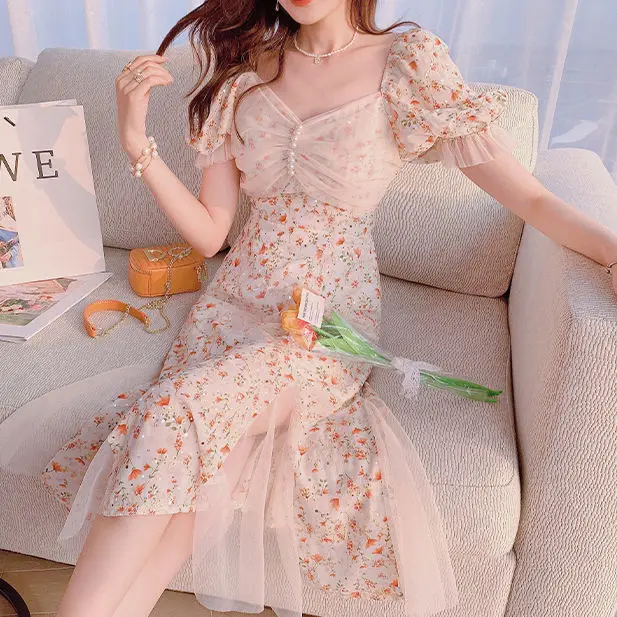 

French sweet dress women's summer 2021 new mesh stitching waist slimming temperament floral short sleeve fishtail skirt
