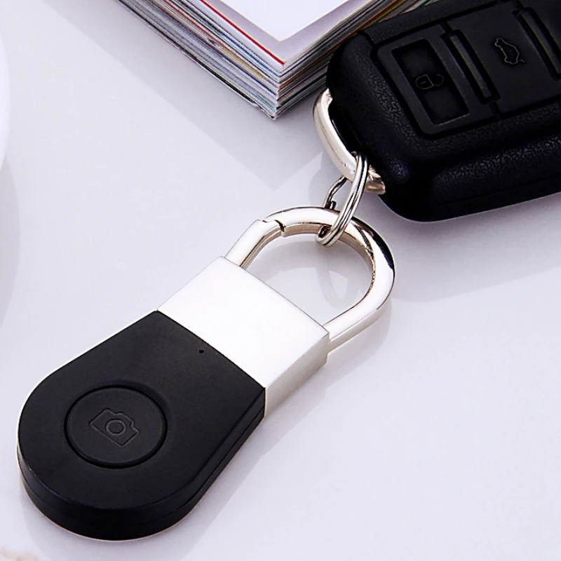 

Anti-Lost for kids Pet dog Key Finder Theft Alarm Locator Smart Mini GPS Tracker Bluetooth remote Shooting Place Tracking Tool