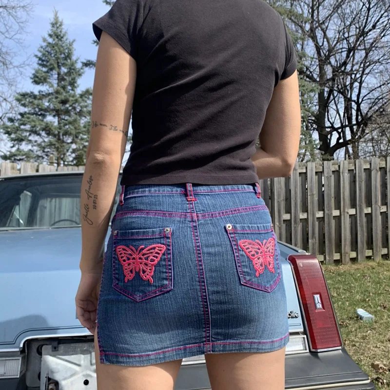 

Denim Skirts Women Summer New Pocket Symmetrical Personality Butterfly Embroidery Mini Skirt Sexy Split Denim Package Hip Skirts