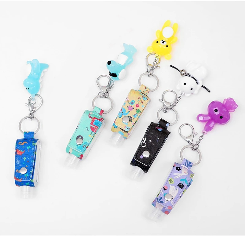 

2021 New 30ml Kids Portable Empty Travel Bottle Cartoon Leather Cover Keychain Holders