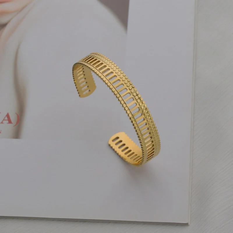 

ALLNEWME Simple Hollow Out Floral Chunky Bangles for Women Mujer Gold Color Stainless Steel Cuff Bracelet Every Day Accessories