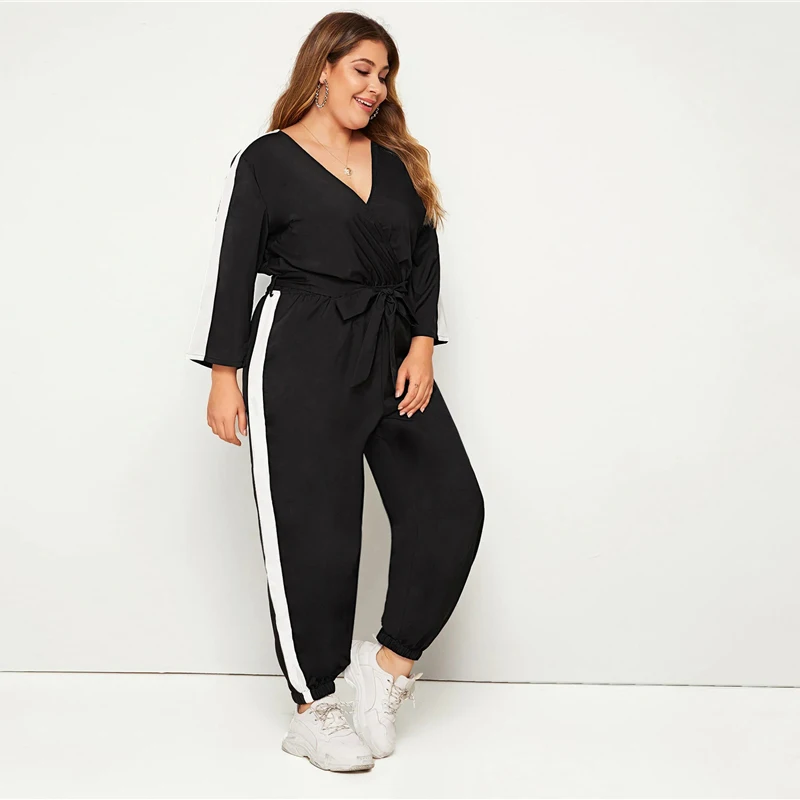 SHEIN плюс размер цветной блок Surplice передний комбинезон с поясом женский весенне-осенний Повседневный v-образный вырез длинный рукав спортивные длинные Комбинезоны