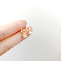 2021 trend women jewelry pearl earrings female simple shell bead hollow earrings cold stainless steel earrings pendientes