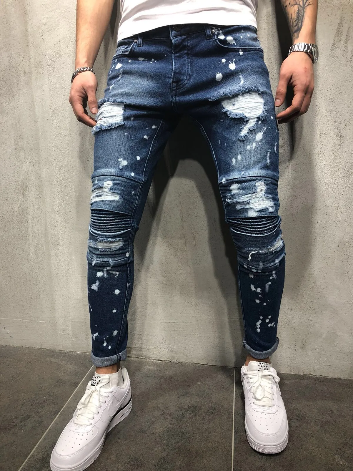 

Men's slim fit small leg jeans heel holes fashionable knee men's motorcycle jeans