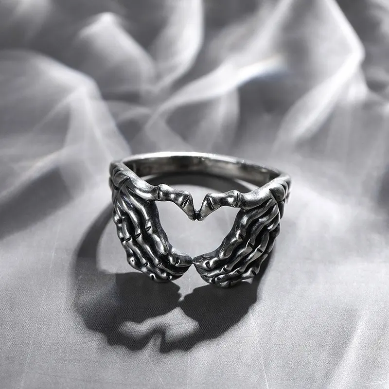 

Silver Plated Hand with Heart Rings for Men Punk Gothic Creative Skeleton Couple Ring Women Hip Hop Band Jewelry Charm Gift