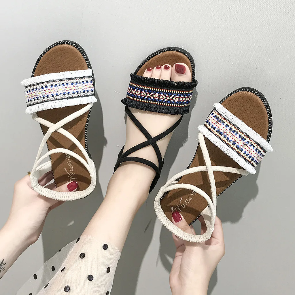 

Women's fashion sandals casual flat with Roman style national wind toe beach shoes elastic band flat sandals new listing