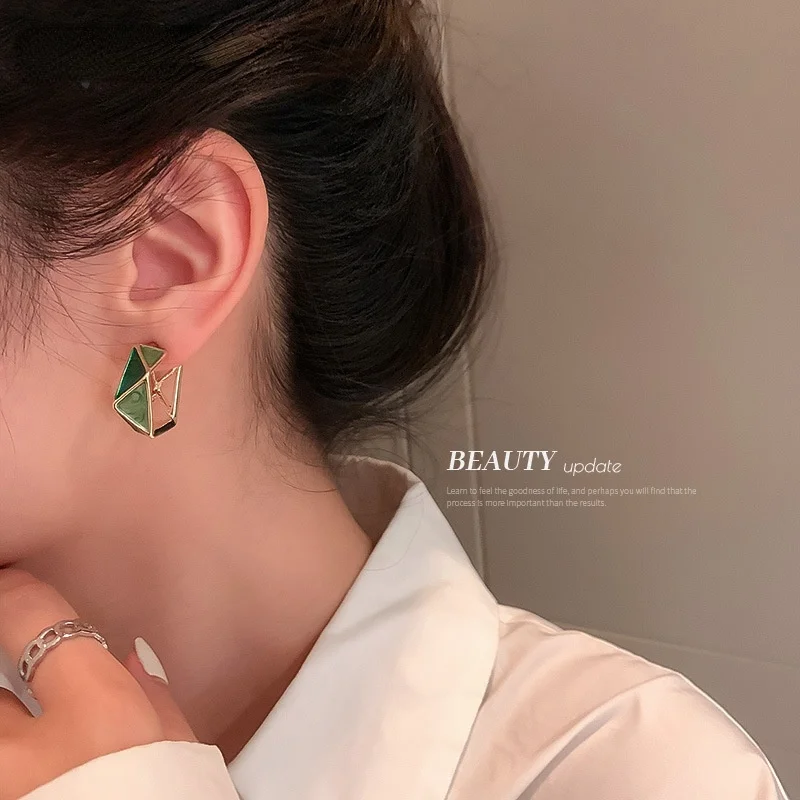 

2021 New 925 Silver Needle Oil Drop Contrast Color Hollowed Retro Korean Versatile Minority Design Earrings Temperament