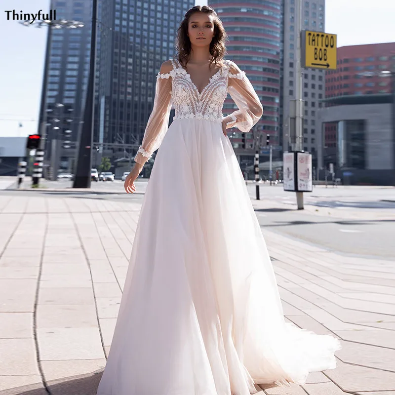 

Thinyfull Очаровательная одежда с длинным рукавом свадебные платья Кружево Иллюзия аппликации в богемном стиле, платья невесты с трапециевидны...