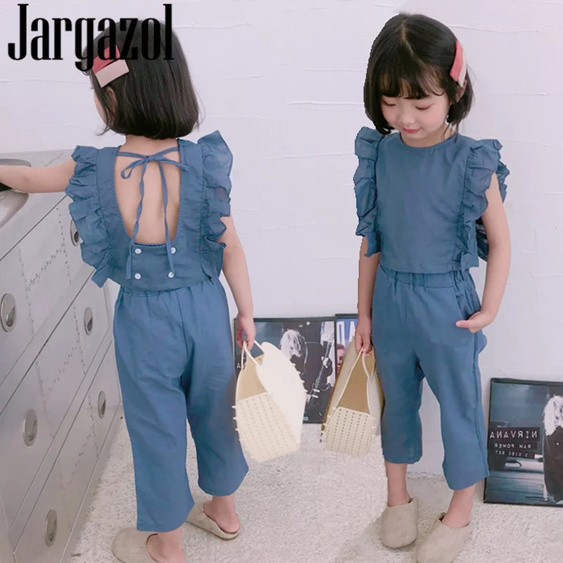 

Летняя модная одежда для девочек, топ с открытой спиной с летающим рукавом и брюки-девятка, корейские Детские костюмы с оборками, комплект детской одежды