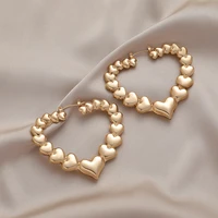 simple fashion personality metal hollow out three dimensional heart shaped light ear ornaments temperament retro earrings woman