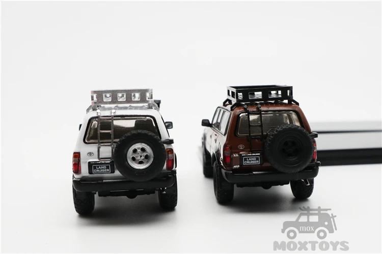 Модель автомобиля под давлением GCD 1:64 Toyota Land Cruiser LC80 красный/коричневый/белый |